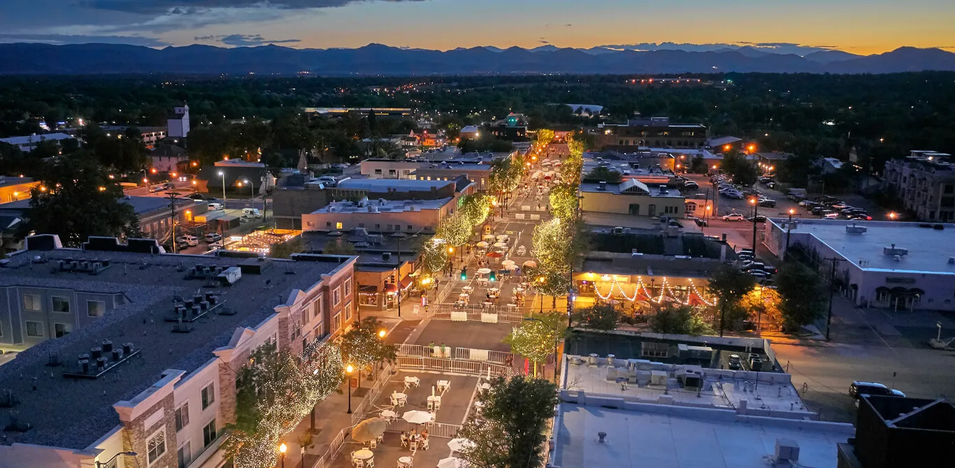 Downtown Littleton, Colorado with the Rocky Mountains at sunset